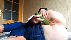 Student fucks in a hostel with a cucumber