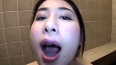 Hot Asian gives blowjob in group sex orgy