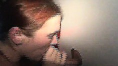 Redhead Slut Blows A Few Cocks And Gets Fucked Hard At The Gloryhole
