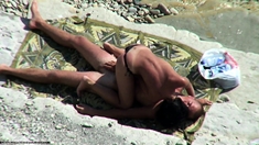 Beach voyeur films amateur oral sex