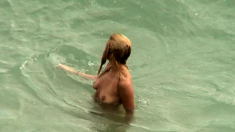 Pretty titties caught by voyeur at beach